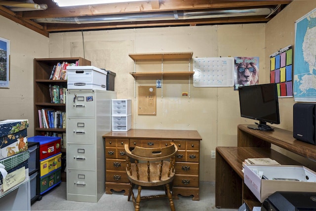 office area with concrete floors