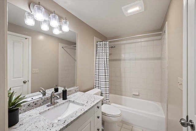 full bath with toilet, tile patterned flooring, shower / bath combo with shower curtain, and vanity