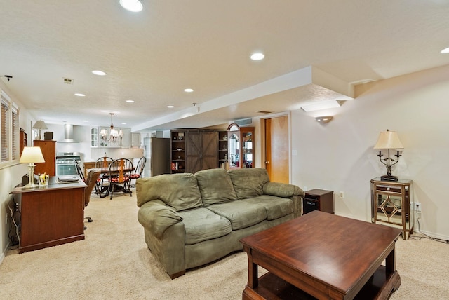 living room with recessed lighting, visible vents, baseboards, and light colored carpet