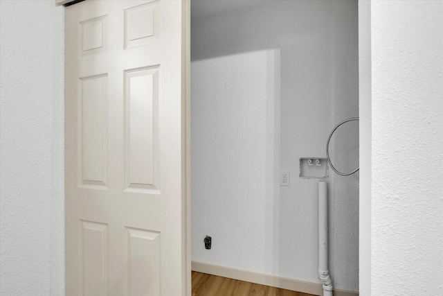 room details featuring wood finished floors and baseboards