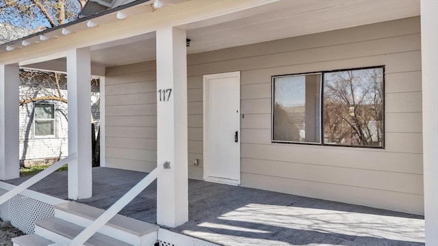 property entrance with a porch