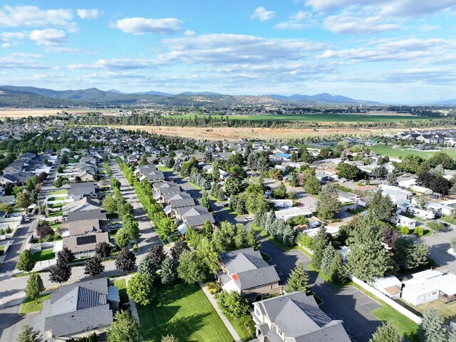 birds eye view of property featuring a residential view and a mountain view