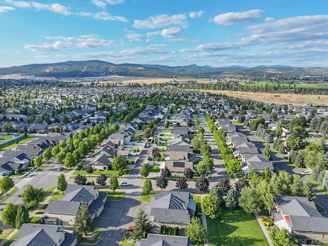 bird's eye view with a residential view and a mountain view