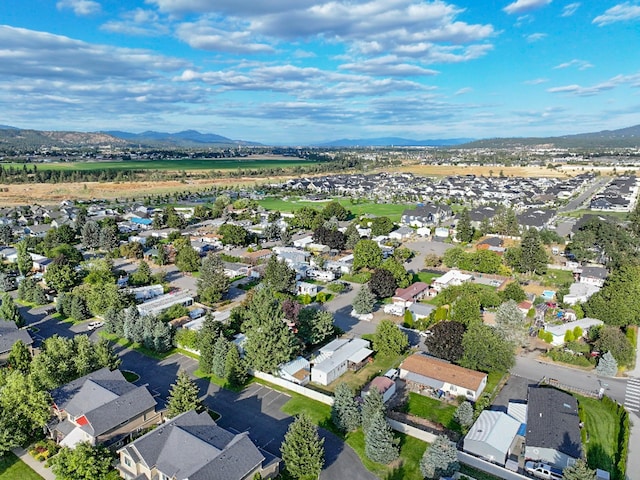 aerial view with a mountain view and a residential view