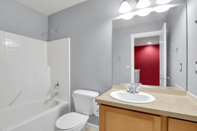 bathroom featuring toilet, washtub / shower combination, and vanity