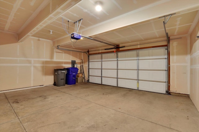 garage featuring a garage door opener