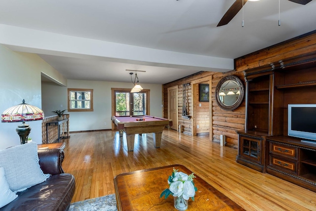 playroom featuring beamed ceiling, pool table, hardwood / wood-style flooring, and log walls