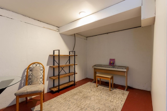 sitting room featuring concrete floors