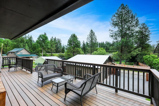 wooden terrace featuring fence