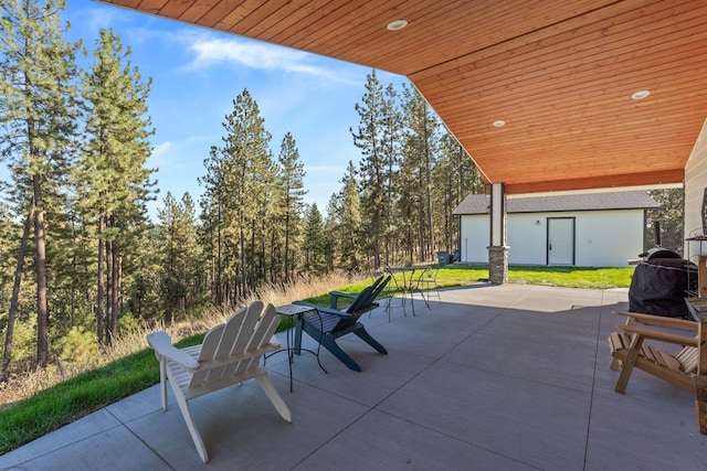 view of patio with an outdoor structure