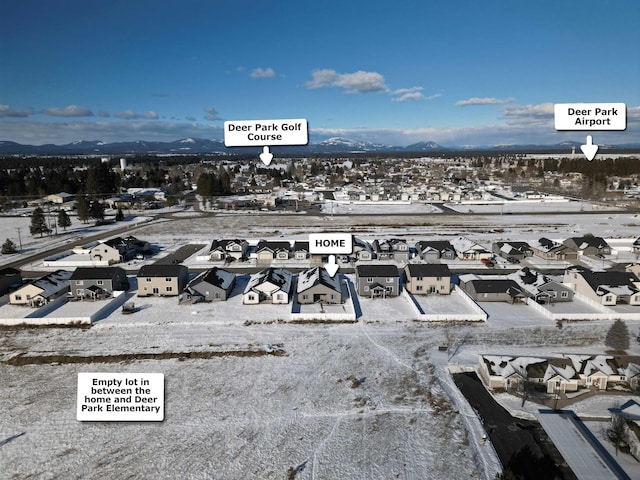 bird's eye view featuring a mountain view and a residential view