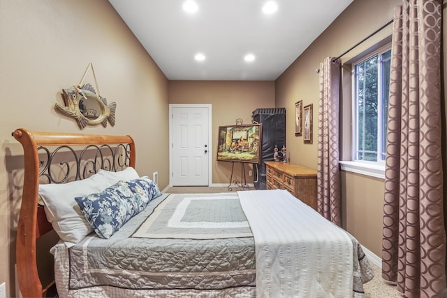 bedroom with multiple windows, recessed lighting, and baseboards