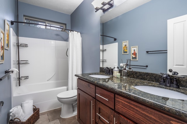 full bath with tile patterned flooring, shower / tub combo, toilet, and a sink