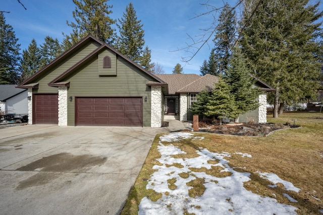 view of front of house with stone siding, concrete driveway, a garage, and a shingled roof