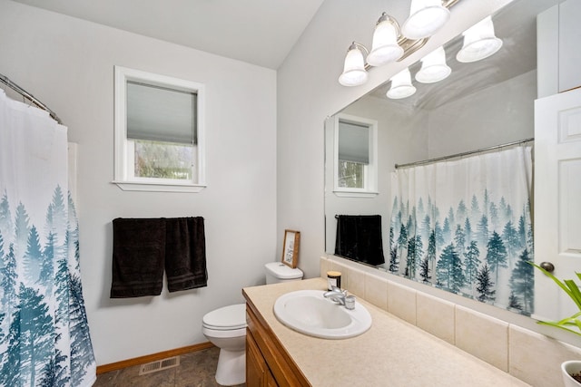 bathroom featuring visible vents, baseboards, toilet, a notable chandelier, and vanity