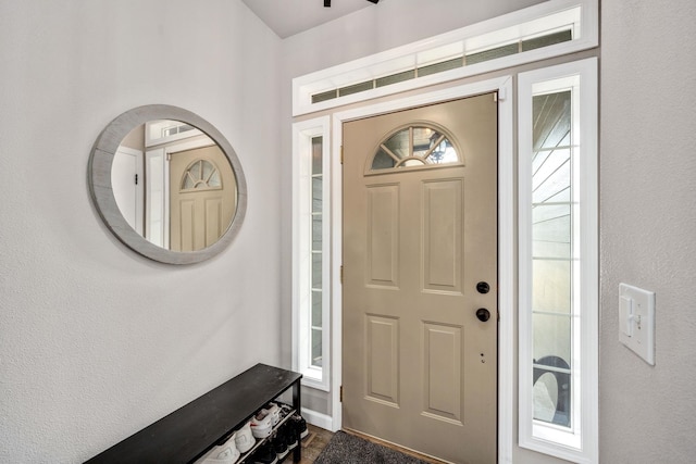 entrance foyer with a textured wall