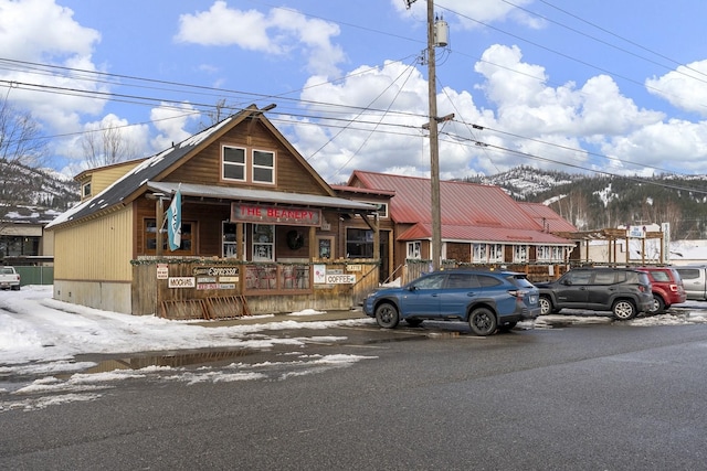 view of front of property featuring metal roof