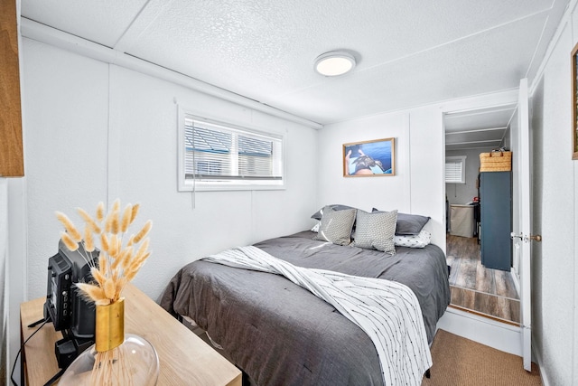 bedroom featuring a textured ceiling