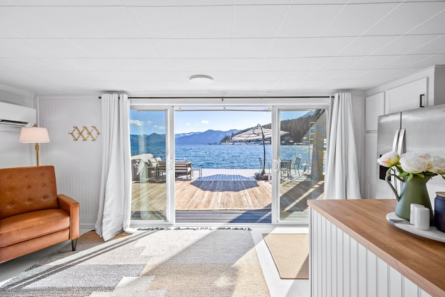 entryway with a mountain view and a wall mounted AC