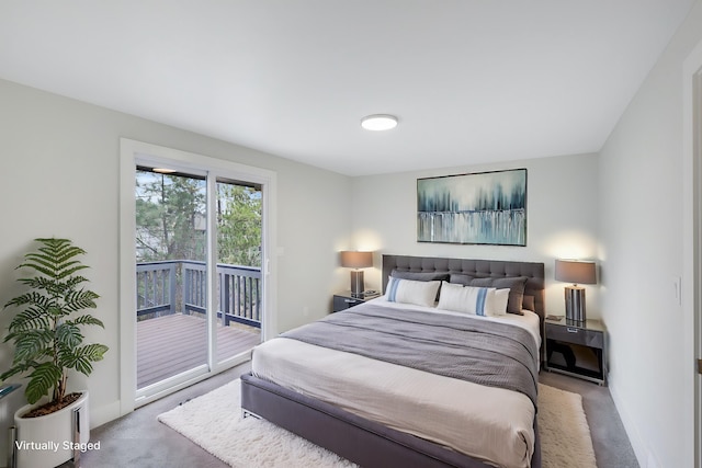 bedroom featuring access to exterior, baseboards, and carpet