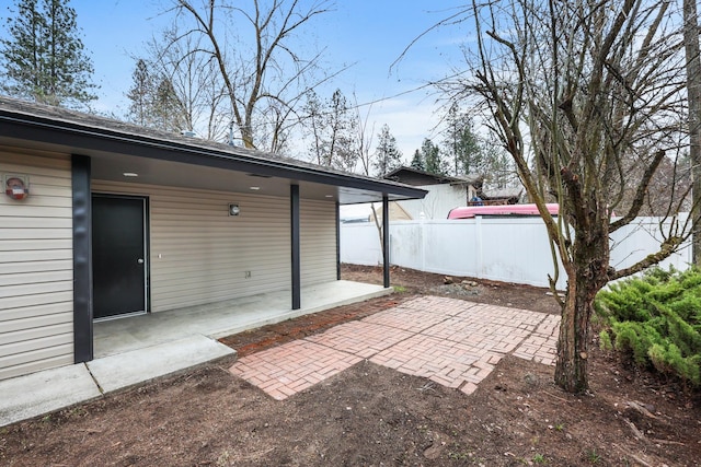 view of patio with fence