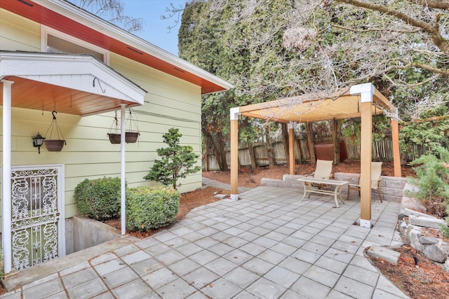 view of patio with fence