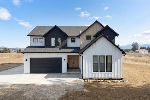 modern farmhouse style home featuring a shingled roof, board and batten siding, driveway, and crawl space