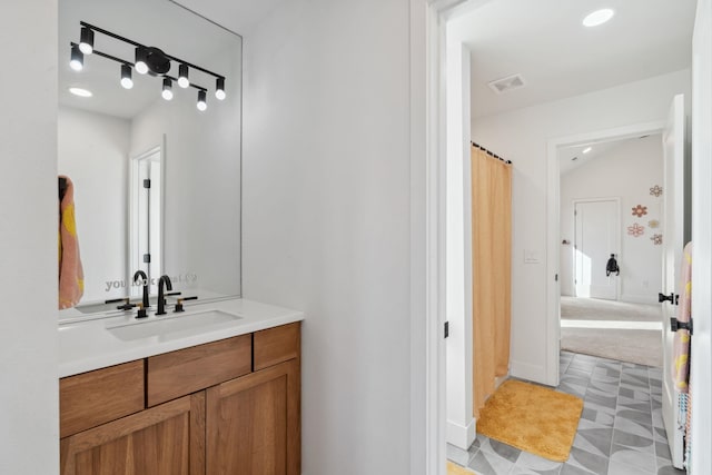 bathroom featuring vanity, a shower with shower curtain, visible vents, recessed lighting, and tile patterned floors