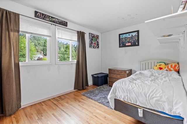 bedroom with light wood-style flooring