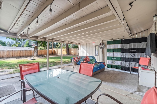 view of patio featuring outdoor dining area, a fenced backyard, and visible vents