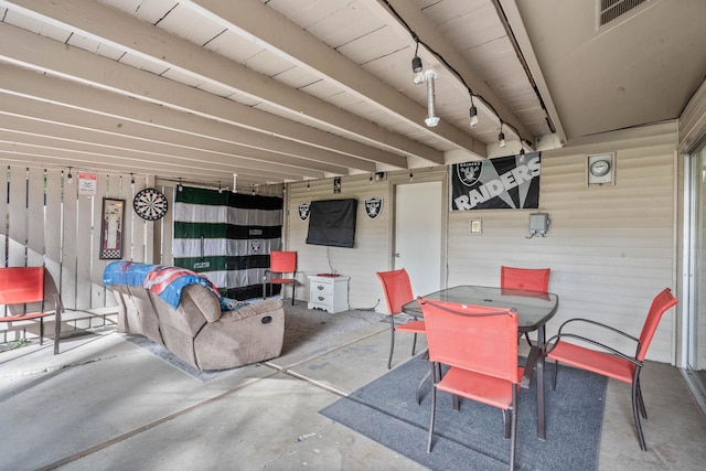 view of patio / terrace with outdoor dining space and visible vents