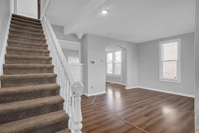 2523 N Nevada St, Spokane, WA 99207 - staircase with arched walkways, baseboards, recessed lighting, and wood finished floors