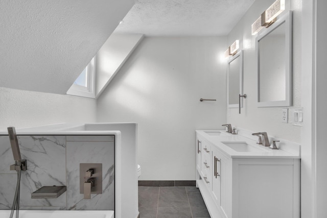 2523 N Nevada St, Spokane, WA 99207 - full bath featuring a textured ceiling, a skylight, a sink, and tile patterned flooring