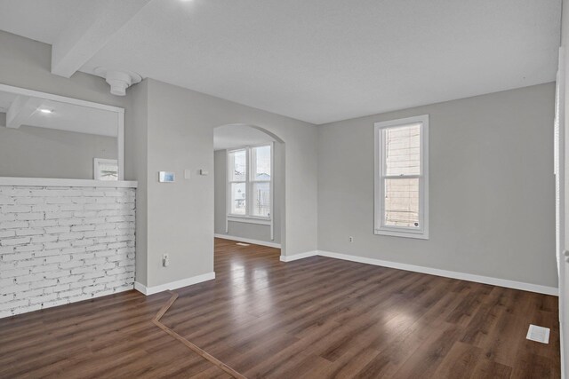 2523 N Nevada St, Spokane, WA 99207 - interior space with arched walkways, baseboards, wood finished floors, and a wealth of natural light