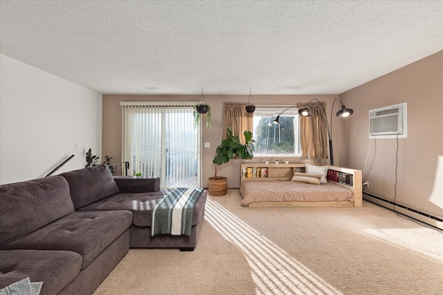 living area with a textured ceiling, baseboard heating, carpet floors, and a wall mounted AC