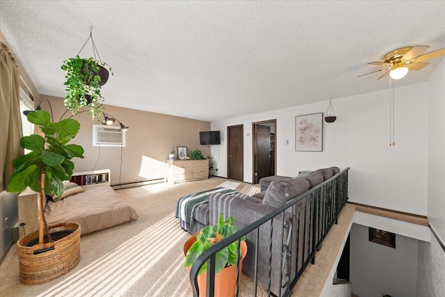 living area with ceiling fan, a wall mounted air conditioner, a textured ceiling, light carpet, and baseboard heating