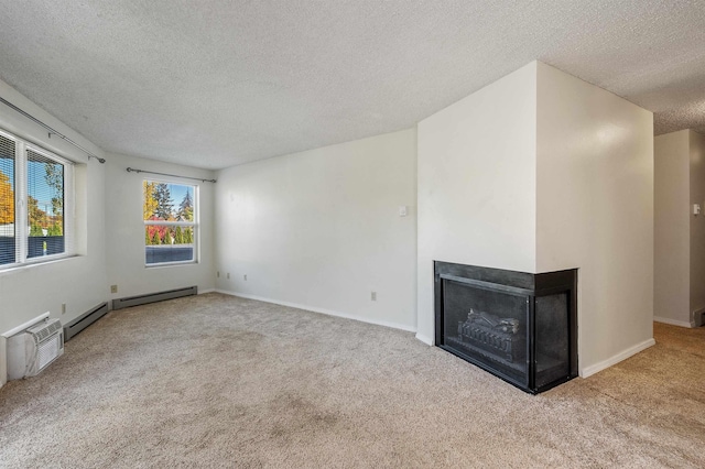 unfurnished living room featuring a textured ceiling, a multi sided fireplace, carpet floors, baseboards, and baseboard heating