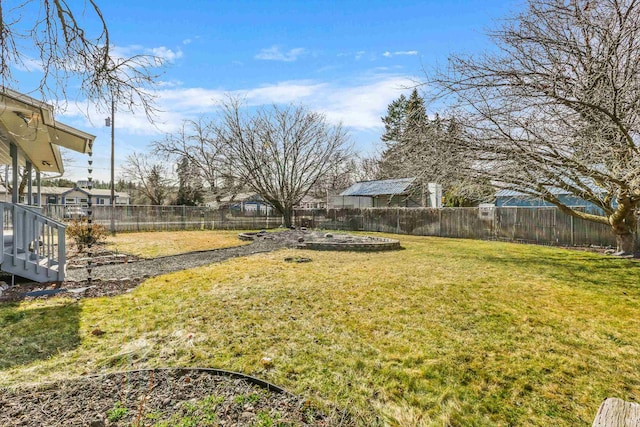 view of yard featuring a fenced backyard