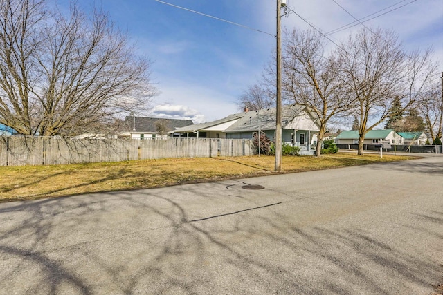 view of front of house with fence