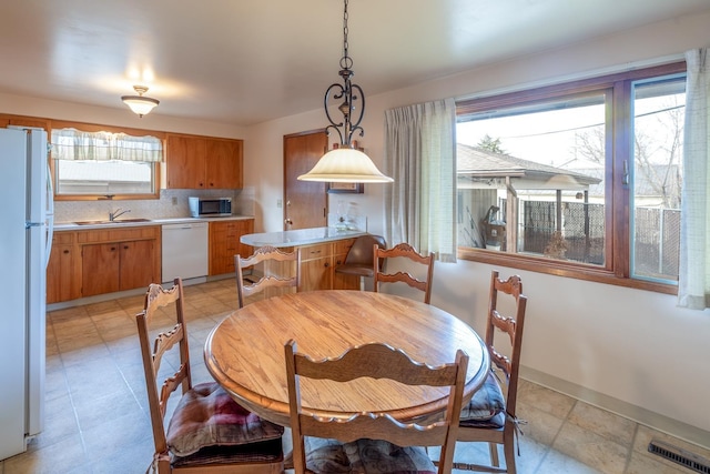 dining space with visible vents