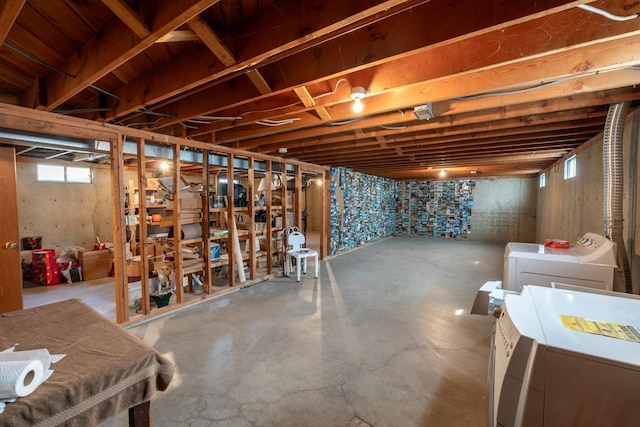 basement featuring washer and clothes dryer