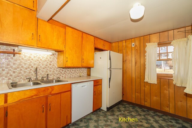 460 E Columbia Ave, Colville, WA 99114 - kitchen featuring a sink, white appliances, light countertops, dark colored carpet, and wood walls