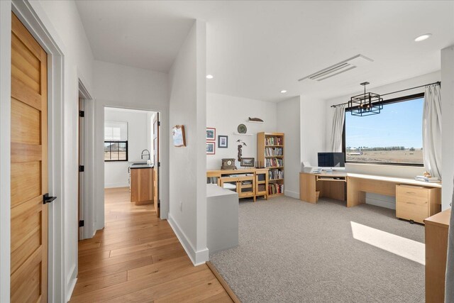 interior space featuring visible vents, recessed lighting, and baseboards