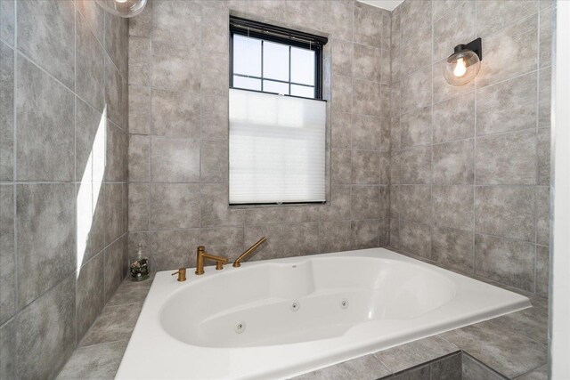 bathroom with a whirlpool tub