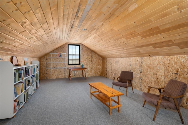 unfurnished room featuring lofted ceiling, carpet floors, and wood ceiling