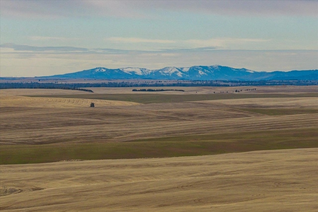 view of mountain feature featuring a rural view