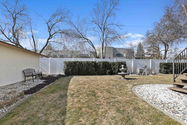 view of yard featuring a fenced backyard