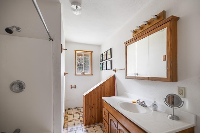 bathroom featuring vanity and tile patterned floors