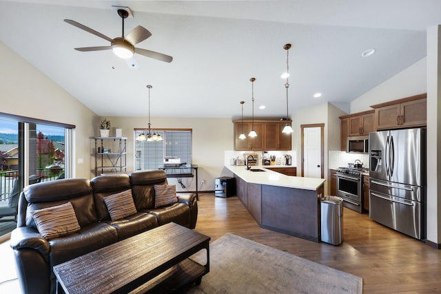 living room featuring recessed lighting, high vaulted ceiling, a ceiling fan, and wood finished floors