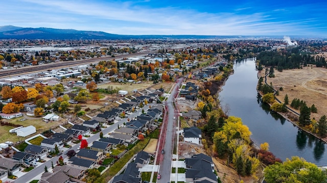 bird's eye view with a residential view and a water and mountain view